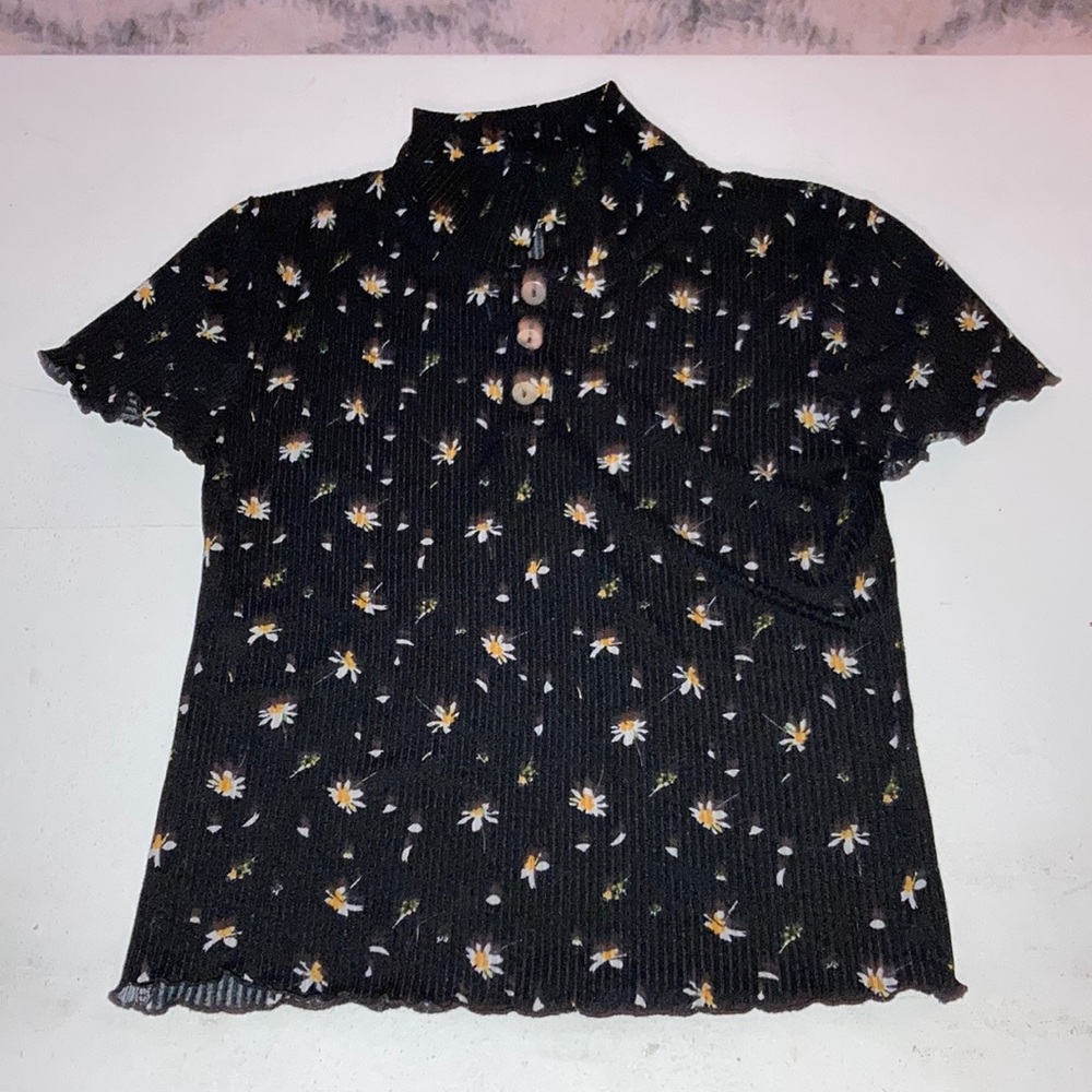 black shirt with white and yellow